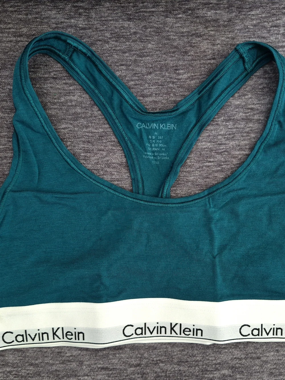 Calvin Klein Women’s Racerback Bralettes 3 pack - Teal, Light Periwinkle & Peach - Picture 10 of 11